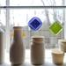 The Eyrie offers many types of handmade items including these porcelain reproductions of bottles and mason jars. Melanie Maxwell I AnnArbor.com